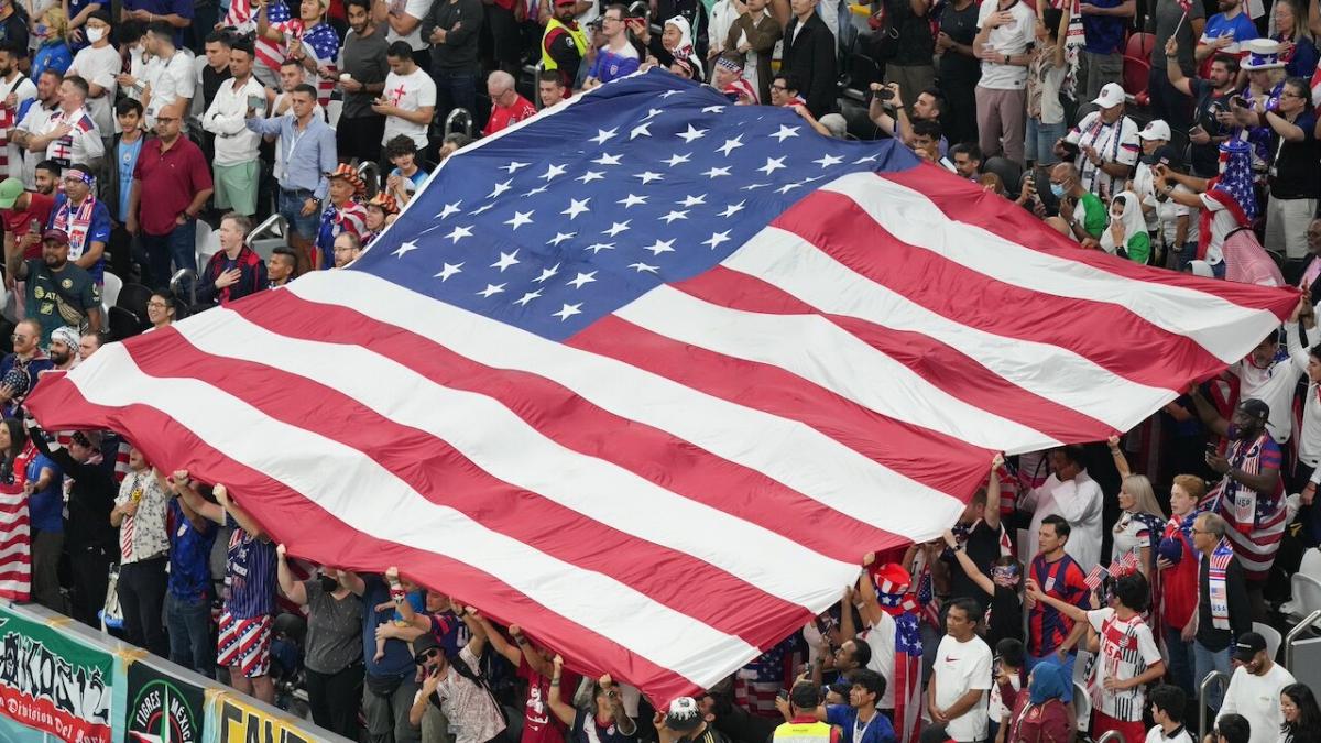 Footballs fans and USA flag